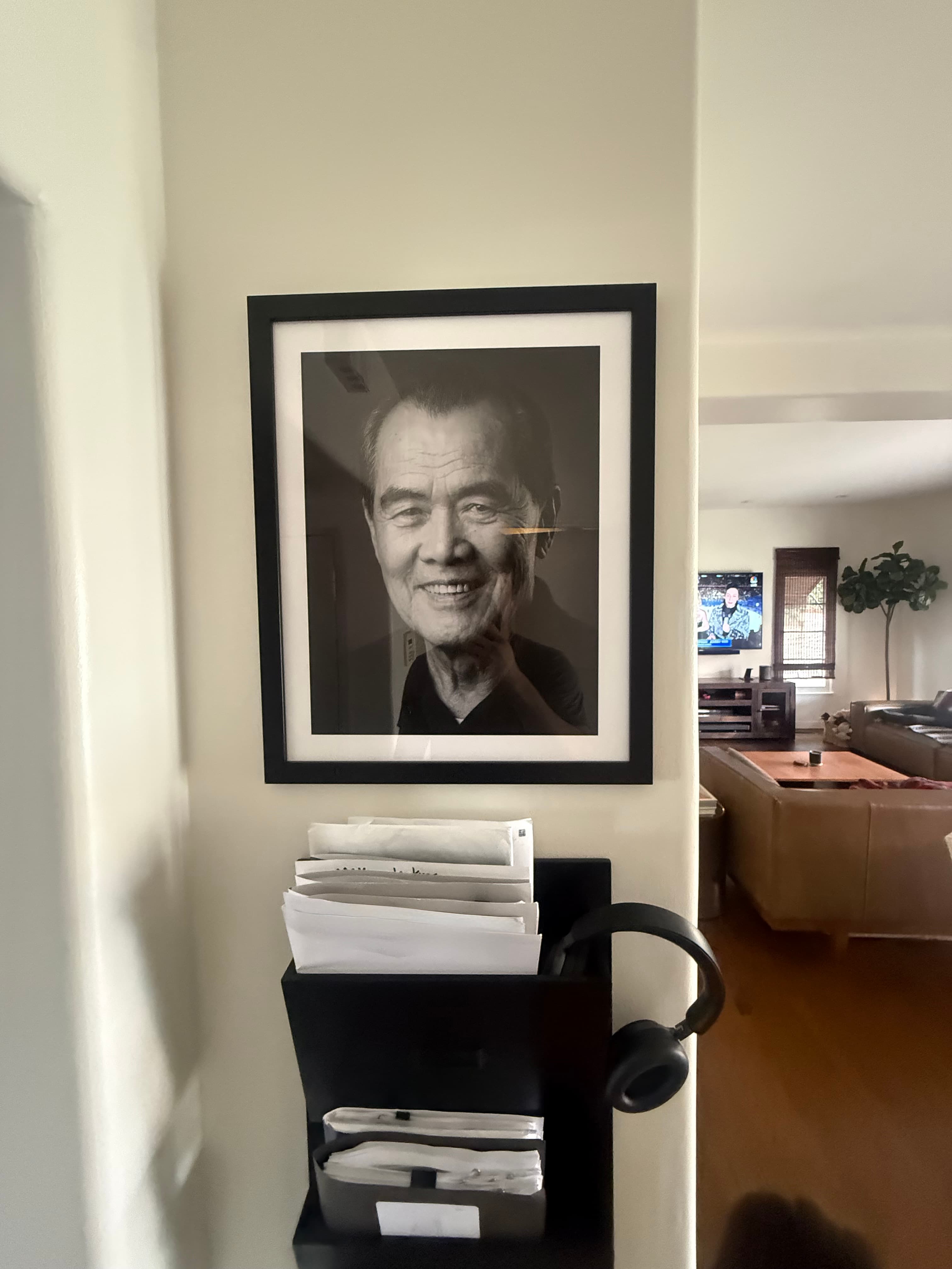 Customer portrait hanging on wall